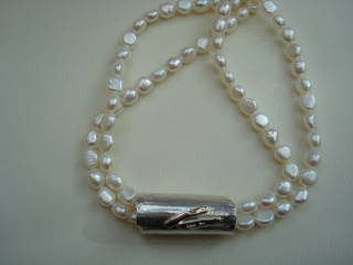 Operal length pearls with removable reticulated silver & gold wrap