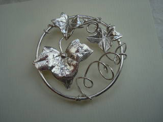IVY ROUNDAL - silver & gold brooch